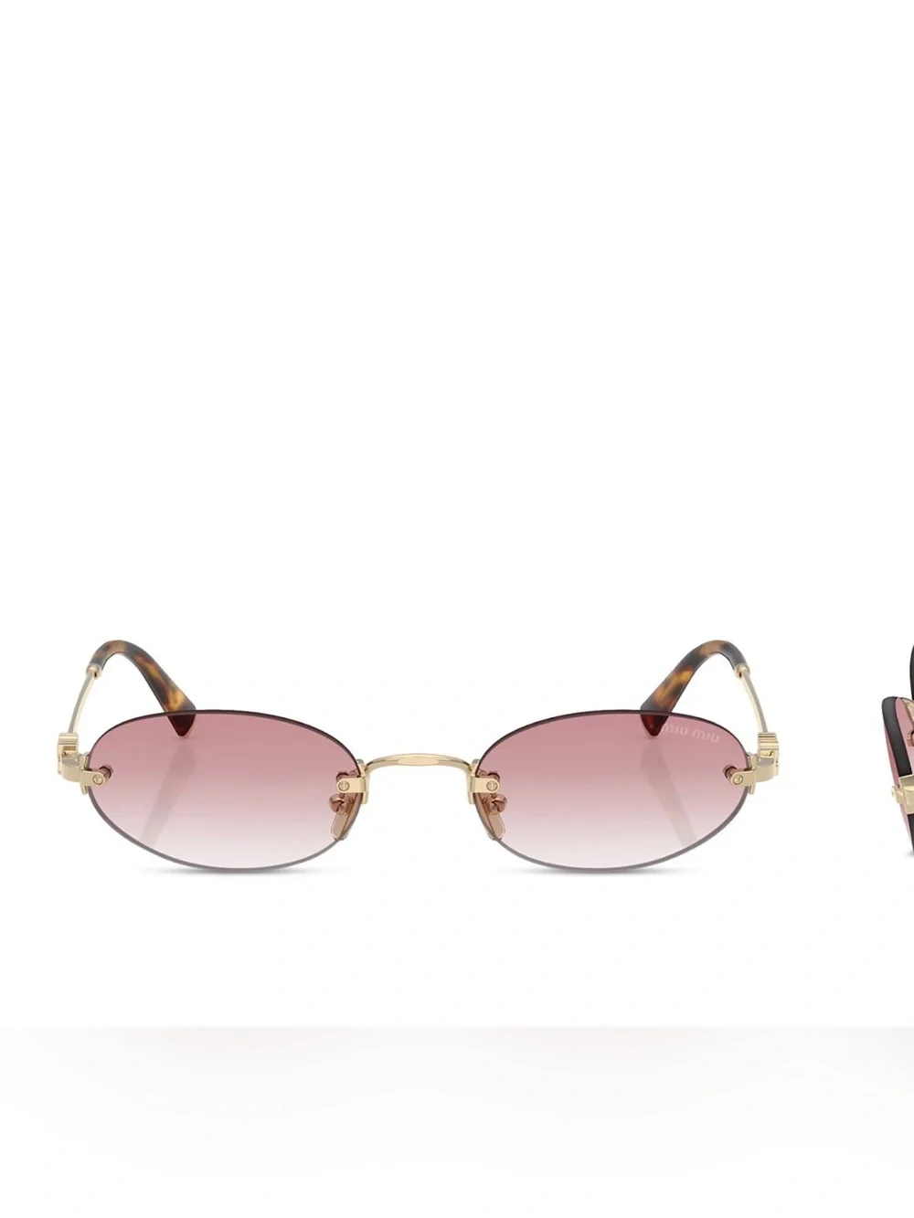 Miu Miu Oval Sunglasses
